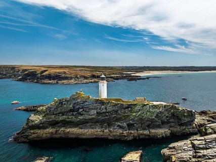 Godrevy Lighthouse from a drone, Godrevy Island, St Ives Bay, Cornwall, England, United Kingdom