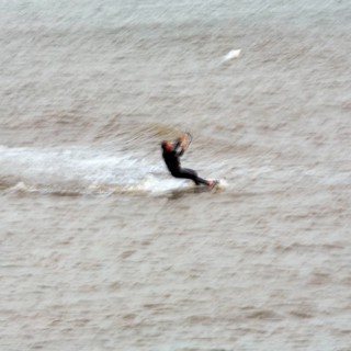 Kitesurfer in the surf, wiping effect, long exposure, Sankt Peter-Ording, Eiderstedt peninsula,