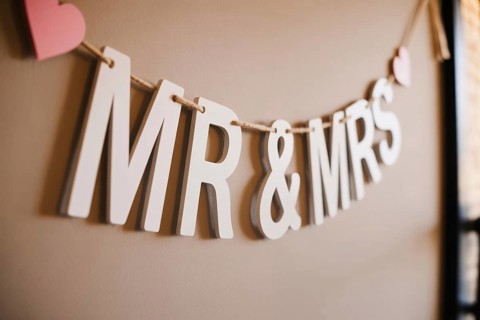 Close up of Mr & Mrs wedding garland with hearts. Romantic wedding decoration detail. Generative