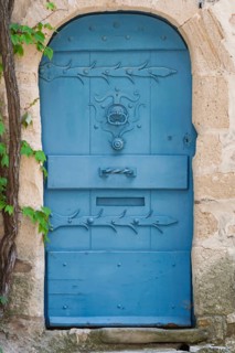 Blue door in a historic house façade, Vaison-la-Romaine, Provence, France