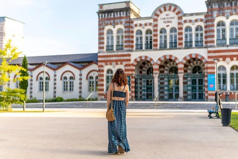 Young woman visiting the famous thermal baths in salies de bearn, a popular spa town in the