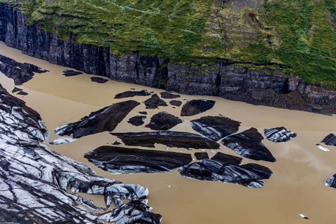 Icebergs, ice floes, glacier tongue, glacier edge, glacier, glacier lagoon, aerial view, black ice,