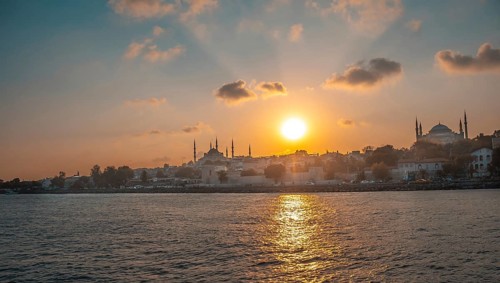 Golden sunset illuminating the historical skyline of istanbul, turkey, featuring the majestic