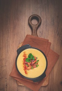 Pumpkin cream soup with shrimp, herbs and spices, homemade, no people