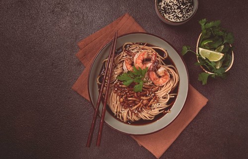 Soba, buckwheat noodles, with shimeji mushrooms and tiger shrimps, sesame, lime, parsley, homemade,