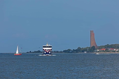 Sailing boat, fjord ferry, naval memorial, Laboe, Kiel Fjord, Schleswig-Holstein, Germany