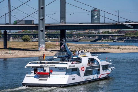 Rhine excursion boat, Rhine Poetry of the KD on the Rhine near Düsseldorf, Rheinkniebrücke, behind