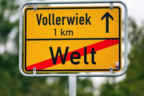 Town sign, traffic sign at the end of the village, end of the village world, inscription, village