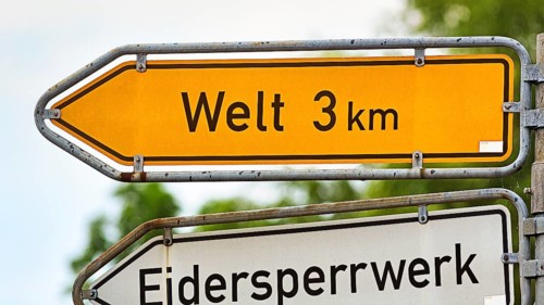 Direction sign to Welt and to the Eidersperrwerk, inscription, distance, village on the Eiderstedt