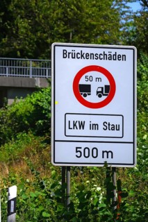 Sign indicating bridge damage on the motorway, Baden-Württemberg, Germany