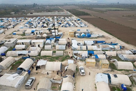 Aerial photo showing dozens of makeshift tents housing Syrian refugees near the Turkish border
