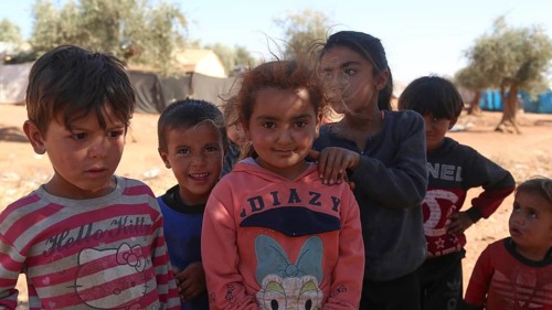 A group of Syrian refugee children gathered inside a camp. Aleppo, Syria. October 29, 2022, Aleppo,