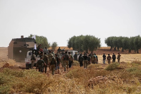 Vehicles and heavy weapons used by Syrian opposition fighters in combat against ISIS. Aleppo, Syria