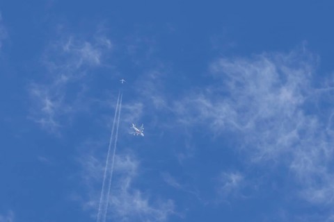Two airliners Airbus A380 jet passenger aircraft of Emirates airlines and a Boeing 737 of Norweign
