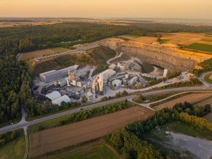 Large quarry and industrial area in a rural setting in the evening, industrial area Wolfsberg