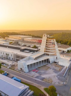 Futuristic-looking modern industrial building in the light of the sunset, Wolfsberg Nagold