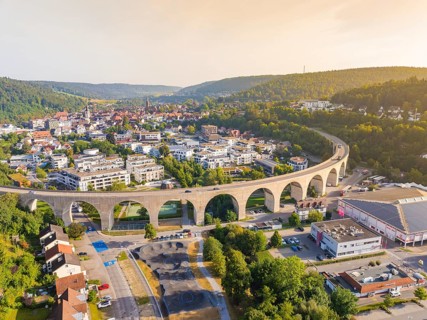 Large viaduct in a town, framed by hills and evening atmosphere, Nagold, district of Calw, Black