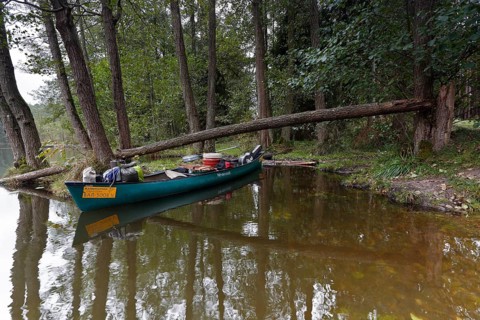 Canoe by nature photographers in Drosedower Bek, Müritz National Park, Mecklenburg-Western