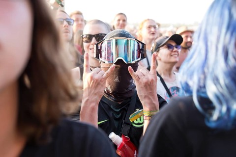 A festival visitor with a ski mask in the audience at the Highfield Festival on Saturday,