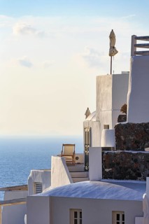 Sun lounger on terrace, holiday home with sea view, evening light, Oia, Thira, Santorini, Cyclades,