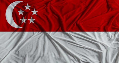Singaporean flag with fabric texture background. National flag of Singapore with cloth texture
