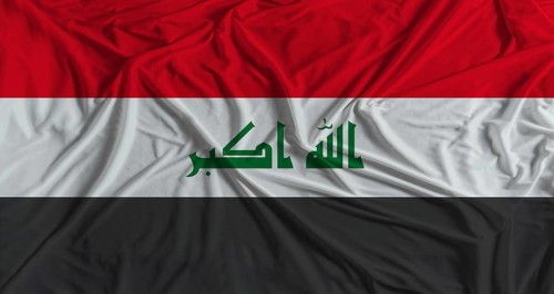 Iraqi flag with fabric texture background. National flag of Iraq with cloth texture