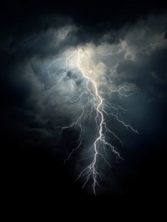 A bright flash passes through dark clouds in a dramatic night scene, AI generated, AI generated