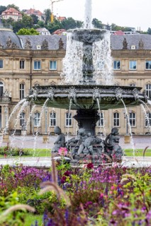 New Palace with Palace Square and fountain. City view of Stuttgart, Baden-Württemberg, Germany