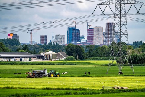 The skyline of the business district in the south-east of Amsterdam, office tower blocks, green