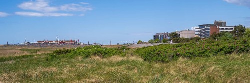 Restaurant and hotel on the promenade, dune landscape, panorama format, Sankt Peter Ording,