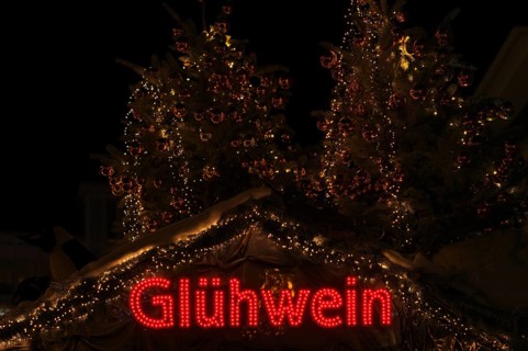 Night view, Glühwein lettering on Christmas stand, Christmas market, Stuttgart, Baden-Württemberg,