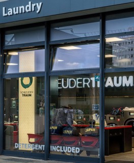 View from outside of a public laundromat, Alexanderplatz, Berlin, Germany