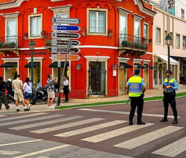 Police officers in uniform on the streets in the resort town of Cascais, Portugal