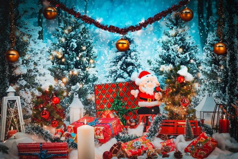 Christmas scene with Santa Claus surrounded by lights and gifts against a winter backdrop