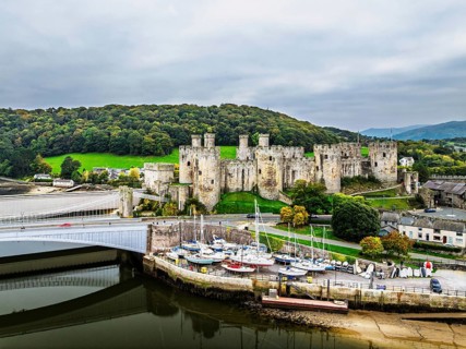 Conwy Castle over River Convy from a drone, Convy, North Wales, England, United Kingdom