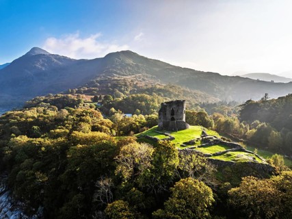 Autumn over Ruins of Dolbadarn Castle from a drone, Llanberis, Llywelyn, North Wales, UK