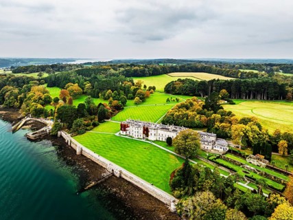 Autumn over Plas Newydd House from a drone, Gardens and Parkland, Llanfairpwllgwyngyll, Anglesey,