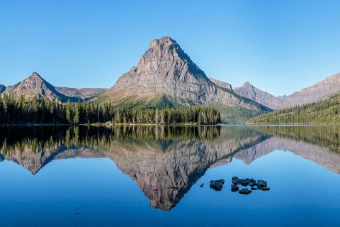 240906_006 Reflection of Sinopah Mountain on Two Medicine Lake at the Two Medicine Ranger Station