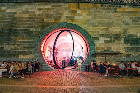 Bar Bike7 on the banks of the Vltava river in the evening in Prague, Czech Republic