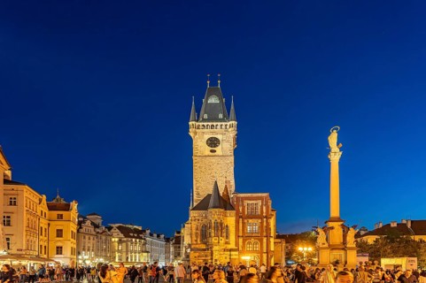 Old Town Town Hall and St. Mary's Column on Old Town Square at dusk, Prague, Czech Republic