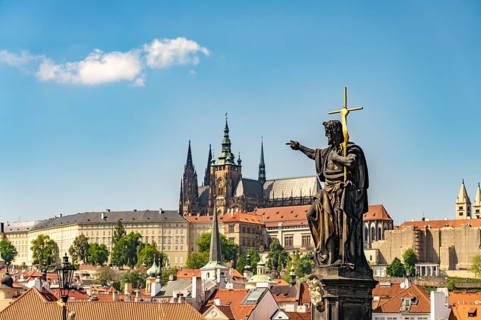 Statue of Saint John the Baptist on Charles Bridge in front of Prague Castle, Prague, Czech