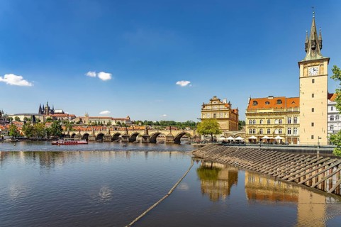 City view of Prague with Vltava River, Old Town Water Tower, Novotný Bridge, Castle and Charles