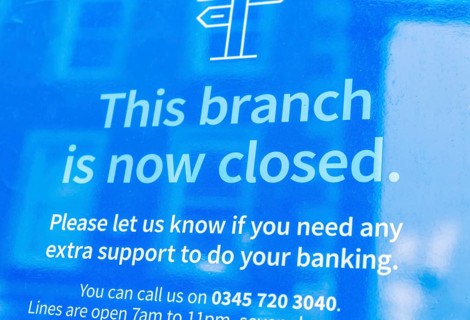 This branch is now closed message in window of branch of shut Barclays bank, UK
