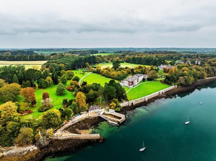 Autumn over Plas Newydd House from a drone, Gardens and Parkland, Llanfairpwllgwyngyll, Anglesey,