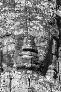 Huge stone-carved face of Bodhisattva Lokeshvara, also Avalokiteshvara, Bayon Temple, Angkor Thom,