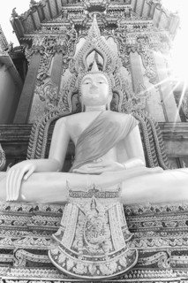 Buddha statue with tunic, Bhumispara mudra, Buddha Gautama at the moment of enlightenment, at the
