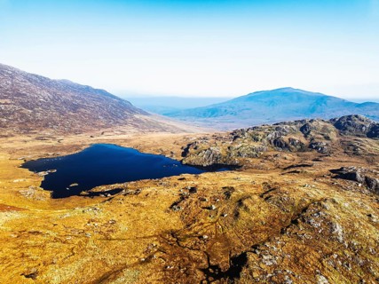 Autumn colours over Llyn Cwmffynnon and Miner's Track, Start Point, road A4086 from a drone,
