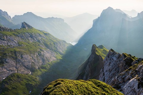 View over Alpstein Mountains into the Meglisalp Valley at sunrise, Rotstein Pass, Säntis,