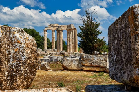 Ancient Greek ruins with columns under a blue sky with clouds, Nemea, Ancient Zeus Heightum,
