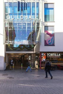 Shoppers at Guildhall shopping centre mall in city centre, Exeter, Devon, England, UK